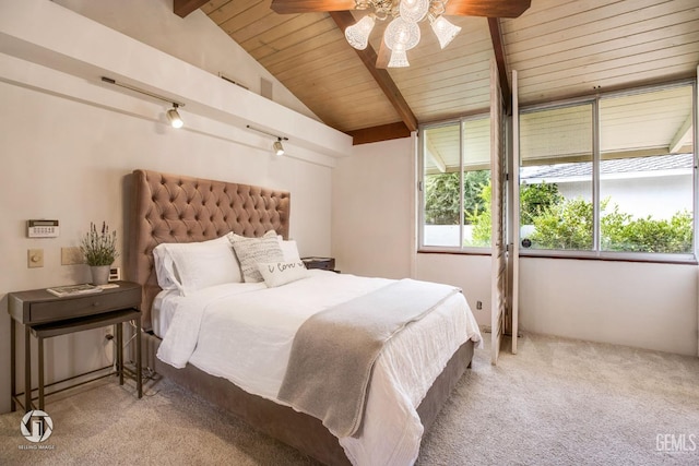 carpeted bedroom with lofted ceiling with beams, ceiling fan, and wood ceiling