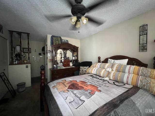800 Lexington St Unit 28, Delano, CA 93215 - carpeted bedroom with a textured ceiling and a ceiling fan