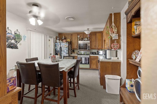800 Lexington St Unit 28, Delano, CA 93215 - dining space featuring ceiling fan