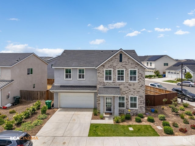 3303 Rustic Woods Ln, Shafter, CA 93263 - traditional home featuring a residential view, driveway, an attached garage, brick siding, and a shingled roof