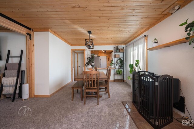 dining area with wooden ceiling