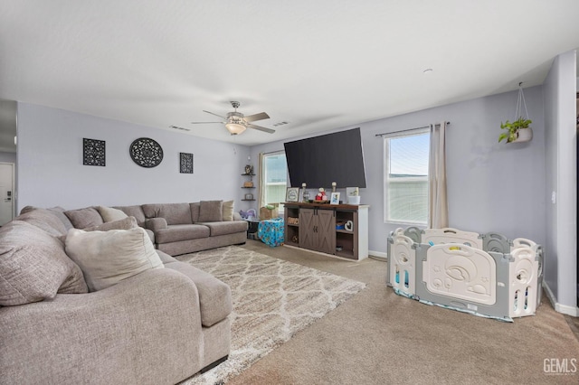 5803 Vespucci Ave, Bakersfield, CA 93313 - carpeted living area featuring ceiling fan and baseboards