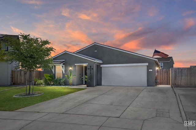 5803 Vespucci Ave, Bakersfield, CA 93313 - ranch-style home with a garage, concrete driveway, and stucco siding
