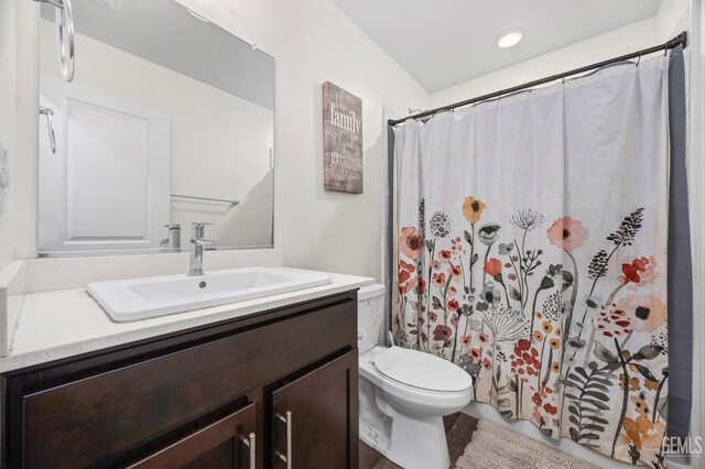 5803 Vespucci Ave, Bakersfield, CA 93313 - bathroom featuring vanity and a shower with shower curtain