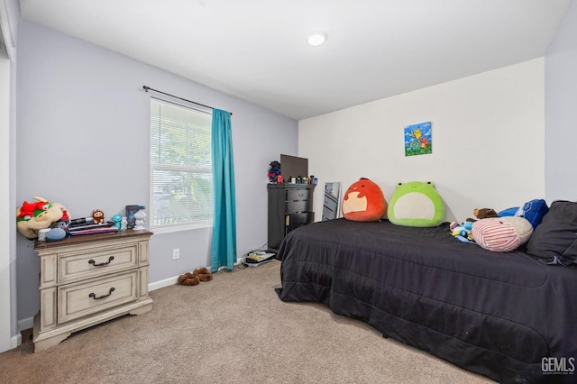 5803 Vespucci Ave, Bakersfield, CA 93313 - bedroom with light colored carpet and baseboards