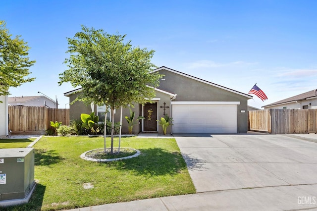 5803 Vespucci Ave, Bakersfield, CA 93313 - view of front of home with driveway, a garage, and stucco siding