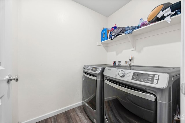 5803 Vespucci Ave, Bakersfield, CA 93313 - washroom with washer and clothes dryer and dark wood-style floors