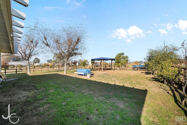 view of yard featuring fence