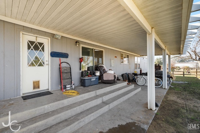 view of patio / terrace featuring fence