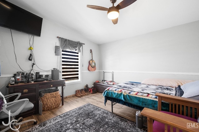 bedroom featuring ceiling fan and wood finished floors