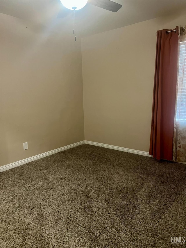 1312 Townsley Ave, Bakersfield, CA 93304 - unfurnished room with carpet flooring, baseboards, and a ceiling fan