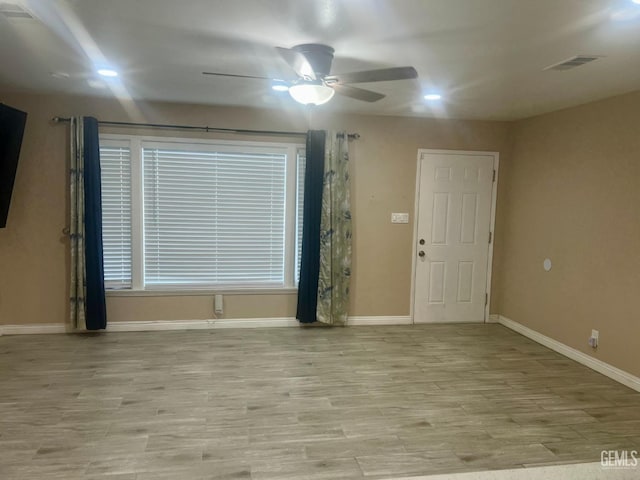 1312 Townsley Ave, Bakersfield, CA 93304 - empty room featuring ceiling fan, light wood-style flooring, baseboards, and recessed lighting