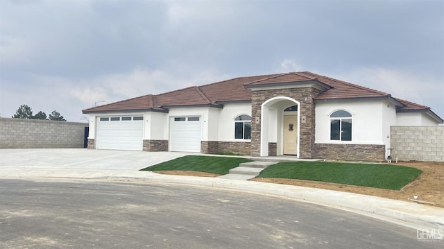 view of front of home with a garage