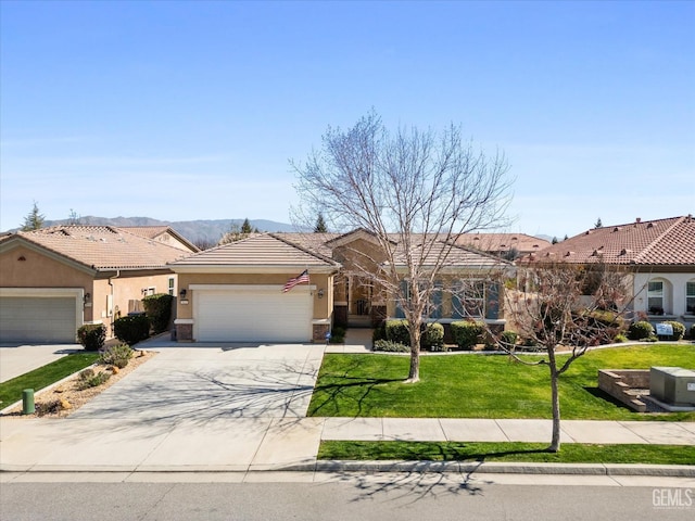 view of front of property featuring a garage, driveway, a residential view, and stucco siding