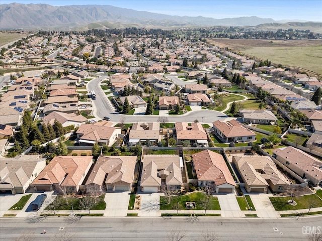 aerial view featuring a residential view and a mountain view