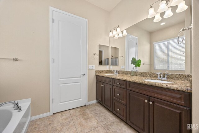 full bathroom with double vanity, a garden tub, tile patterned flooring, and a sink