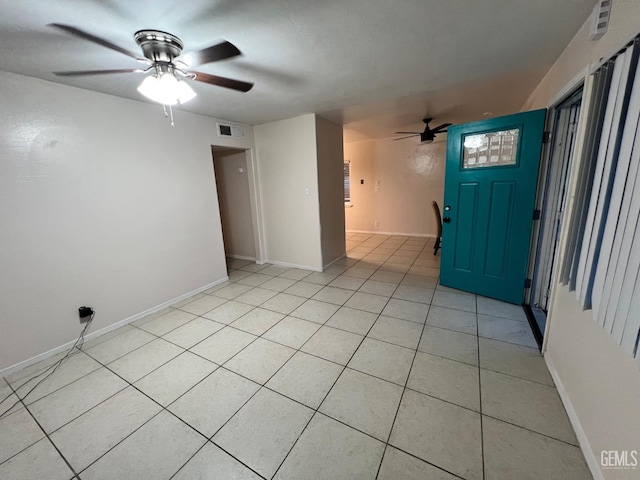 1208 W Point Dr, Bakersfield, CA 93305 - spare room featuring a ceiling fan, light tile patterned floors, and baseboards