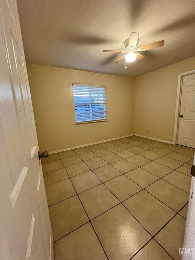 1208 W Point Dr, Bakersfield, CA 93305 - spare room with light tile patterned flooring, ceiling fan, and baseboards