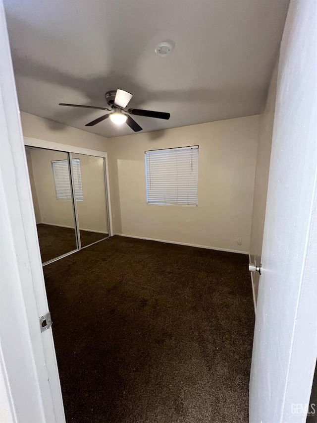 1208 W Point Dr, Bakersfield, CA 93305 - unfurnished bedroom featuring carpet, a closet, and ceiling fan