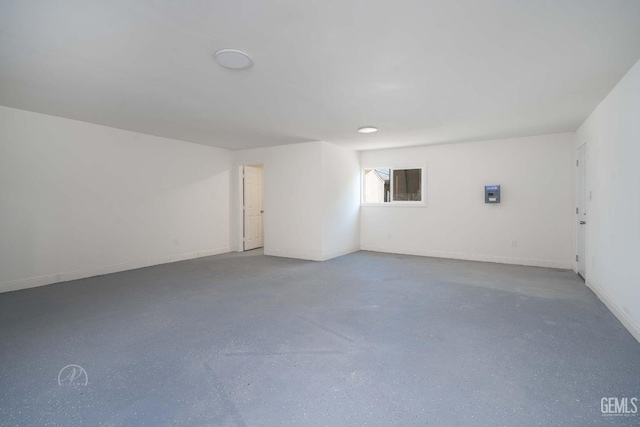 empty room with baseboards