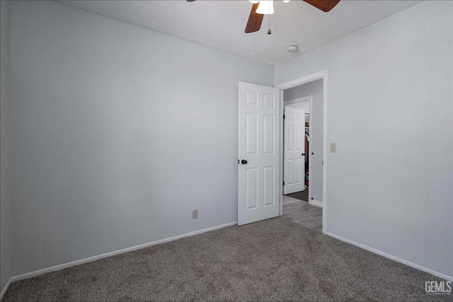 6513 Derby Dr, Bakersfield, CA 93306 - carpeted spare room featuring ceiling fan, a textured ceiling, and a smoke detector
