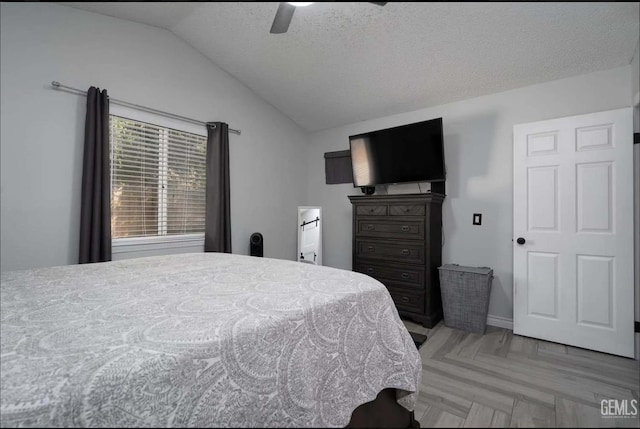 6513 Derby Dr, Bakersfield, CA 93306 - bedroom with lofted ceiling, a ceiling fan, and a textured ceiling