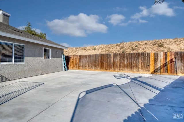 6513 Derby Dr, Bakersfield, CA 93306 - fenced backyard with a patio area