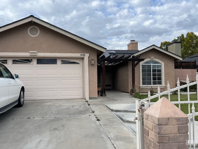 ranch-style house with stucco siding, concrete driveway, a garage, and fence