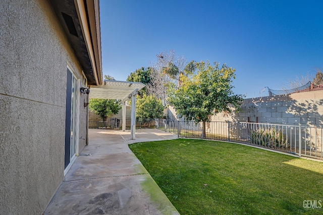 view of yard featuring a pergola and a patio