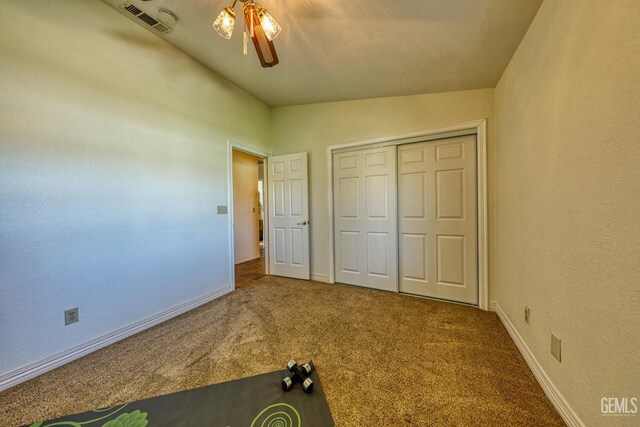 22824 Mariposa Rd, Tehachapi, CA 93561 - unfurnished bedroom with baseboards, visible vents, a closet, and carpet
