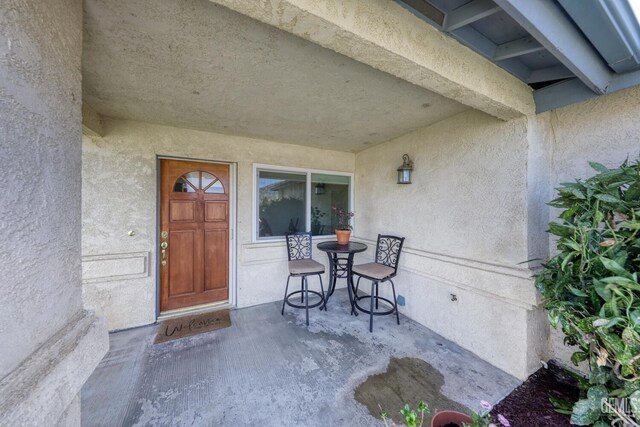 22824 Mariposa Rd, Tehachapi, CA 93561 - view of exterior entry with stucco siding