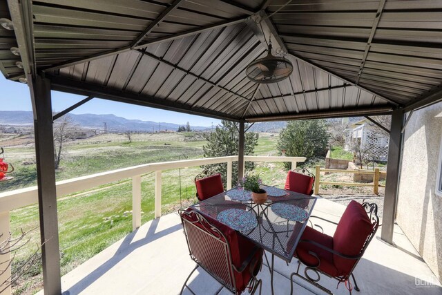 22824 Mariposa Rd, Tehachapi, CA 93561 - view of patio / terrace featuring outdoor dining area, a mountain view, a gazebo, and a rural view