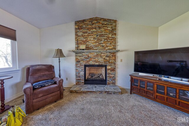 22824 Mariposa Rd, Tehachapi, CA 93561 - living room with a stone fireplace, baseboards, lofted ceiling, and carpet flooring