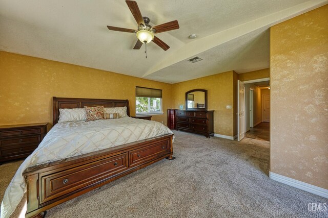 22824 Mariposa Rd, Tehachapi, CA 93561 - bedroom featuring lofted ceiling, baseboards, visible vents, a ceiling fan, and light carpet