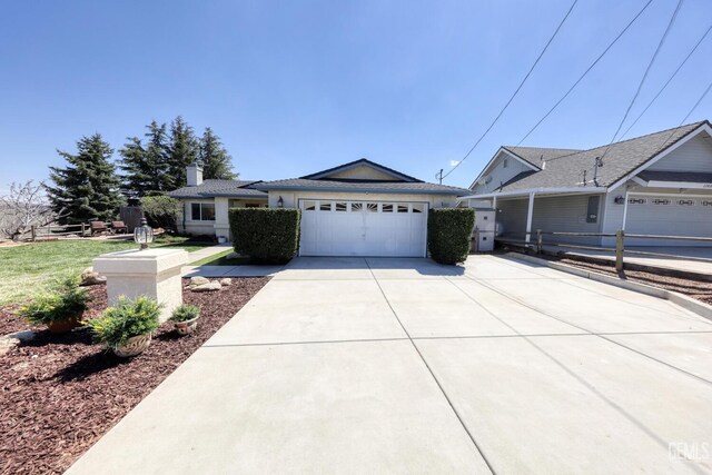 22824 Mariposa Rd, Tehachapi, CA 93561 - ranch-style home featuring a garage and concrete driveway