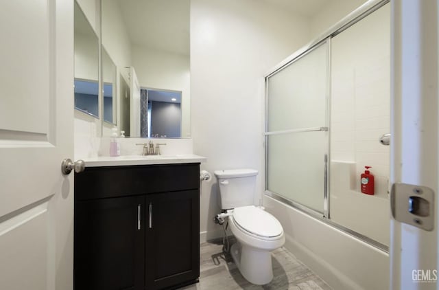15920 Waterford St, Bakersfield, CA 93314 - bathroom featuring vanity and shower / bath combination with glass door