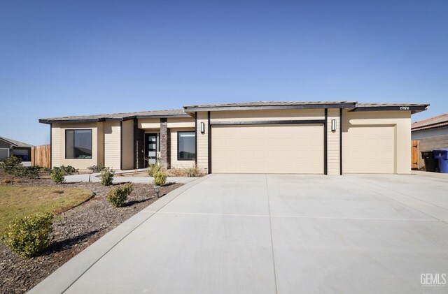 15920 Waterford St, Bakersfield, CA 93314 - prairie-style house with an attached garage and driveway