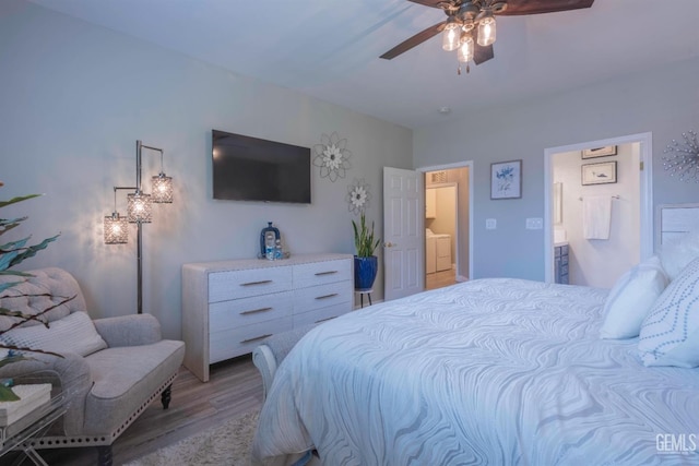 bedroom with light hardwood / wood-style floors, washer and dryer, and ceiling fan