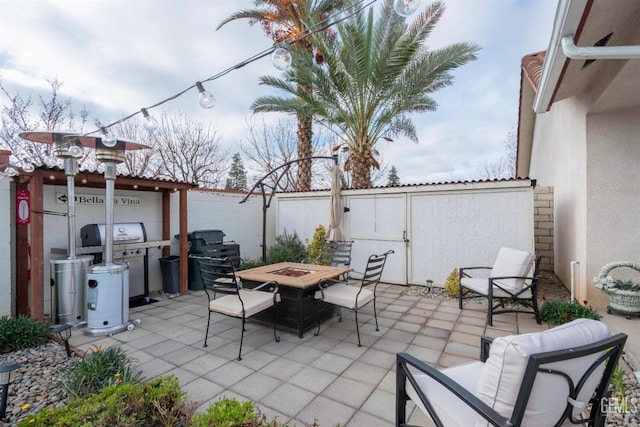 view of patio featuring a fire pit