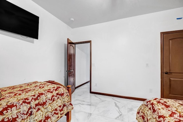 28124 Mustang Ave, Taft, CA 93268 - bedroom featuring light marble finish flooring and baseboards