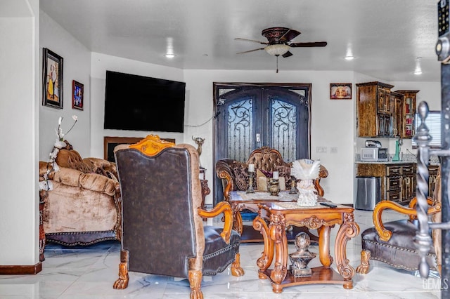 28124 Mustang Ave, Taft, CA 93268 - living area with ceiling fan, marble finish floors, and french doors