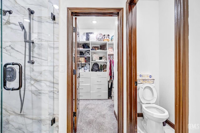 28124 Mustang Ave, Taft, CA 93268 - full bath with a marble finish shower, a spacious closet, and toilet
