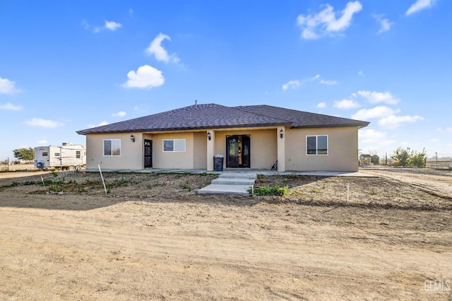 28124 Mustang Ave, Taft, CA 93268 - view of front of house featuring stucco siding