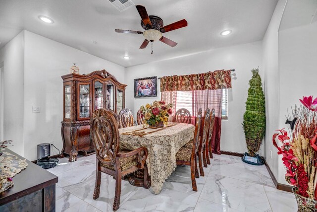 28124 Mustang Ave, Taft, CA 93268 - dining space featuring ceiling fan, recessed lighting, light marble finish flooring, and baseboards