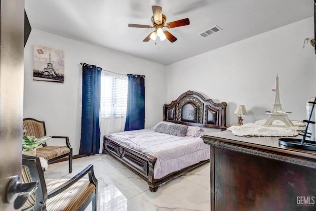 28124 Mustang Ave, Taft, CA 93268 - bedroom featuring light marble finish flooring and a ceiling fan