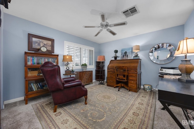 interior space featuring carpet, visible vents, ceiling fan, and baseboards