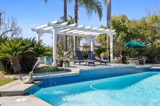 view of swimming pool with a fenced in pool, a patio area, and a pergola