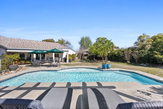 outdoor pool with a patio