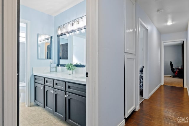 interior space with light wood-style floors and baseboards