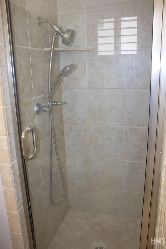 bathroom with a stall shower